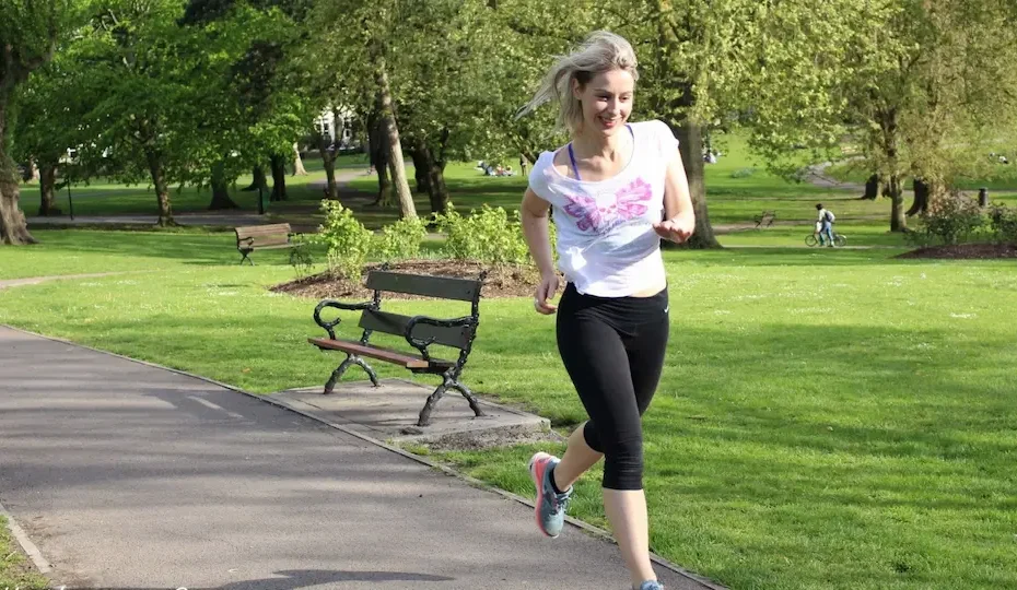 Grace Fitness founder Kathrine Grace jogging outdoors in Bristol, inspiring clients on their fitness journey